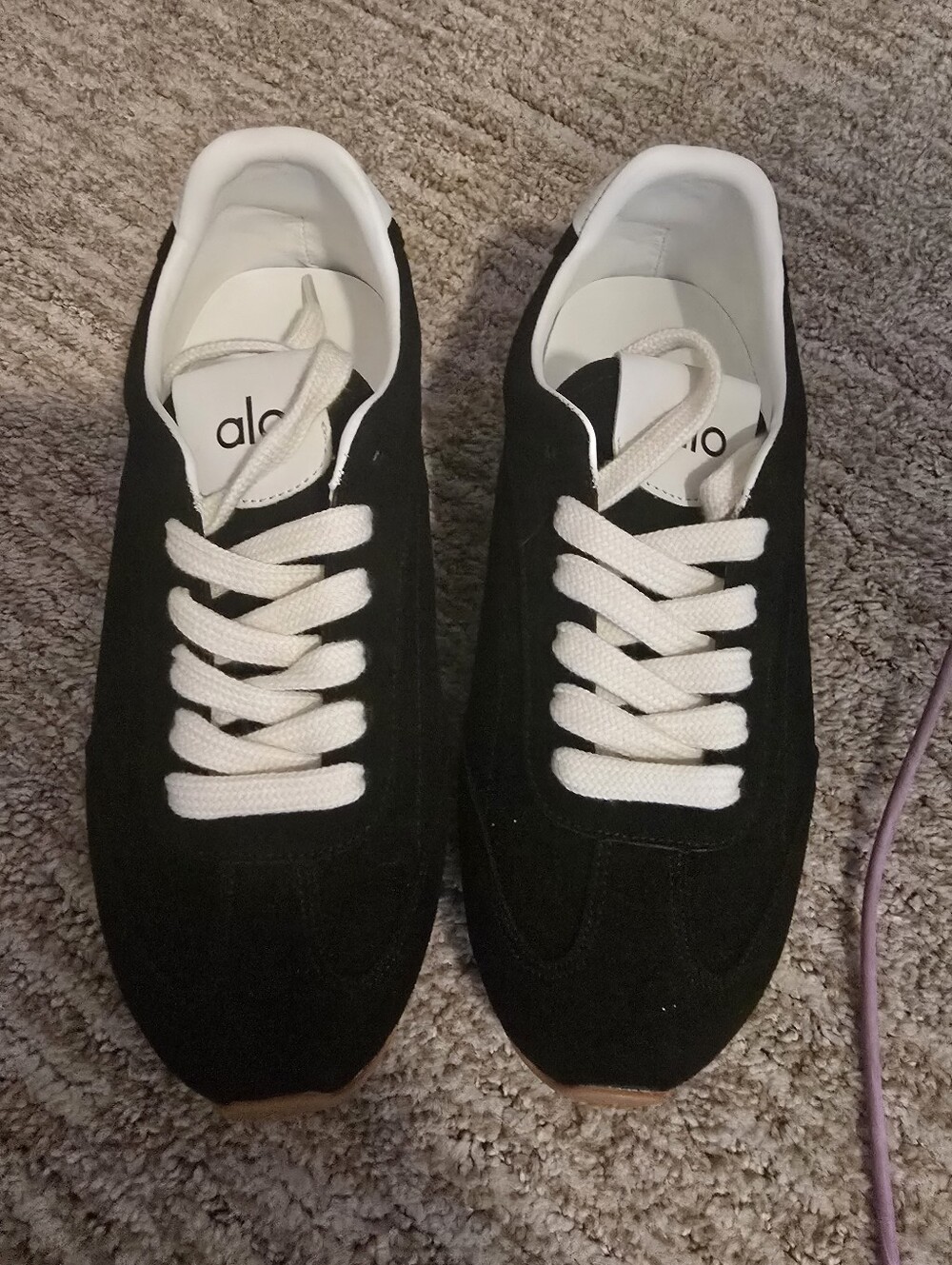 ALO Yoga black sneakers with white laces